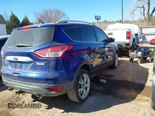 2016 Ford Escape Titanium with VIN 1FMCU0J95GUC41632, listed as a IAAI auction lot 41692040 with 144,834 mi miles. Bid and sale history available at carsss.com. Image 4.