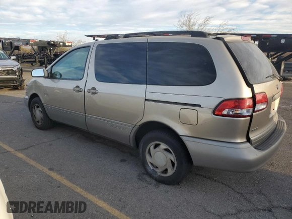 2002 Toyota Sienna LE with VIN 4T3ZF13C12U486009, listed as a Copart auction lot 87877695 with 250,778 mi miles and Salvage Title. Bid and sale history available at carsss.com. Image 2.