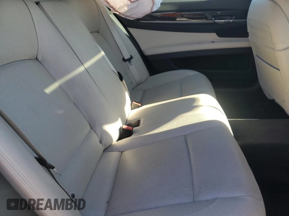 2014 BMW 7 Series 740Li with VIN WBAYE4C56ED138593, listed as a Copart auction lot 82010534 with 88,393 mi miles and Salvage Title. Bid and sale history available at carsss.com. Image 10.