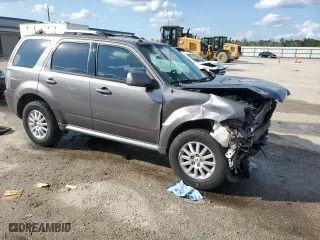 2010 Mercury Mariner Premier with VIN 4M2CN8HG5AKJ00531, listed as a Copart auction lot 68167794 with 184,969 mi miles and Salvage Title. Bid and sale history available at carsss.com. Image 4.