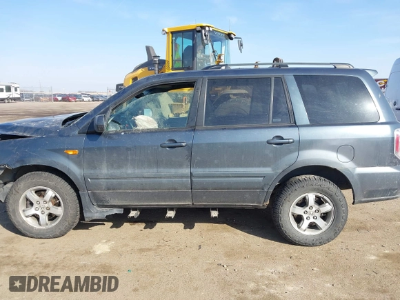 2006 Honda Pilot EX-L with VIN 5FNYF18656B012252, listed as a IAAI auction lot 41801738 with 246,191 mi miles and . Bid and sale history available at DreamBid. Image 15.