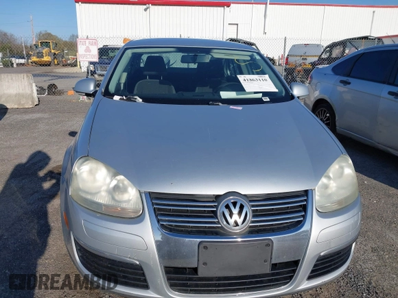 2009 Volkswagen Jetta S z VIN 3VWJM71K09M041494, wystawiony jako IAAI lot #41863110 z przebiegiem Nie podano mil oraz . Historia ofert i sprzedaży dostępna na DreamBid. Obrazek 6.