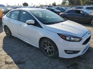 2016 Ford Focus SE with VIN 1FADP3F26GL336032, listed as a Copart auction lot 48334005 with 107,527 mi miles and Clean title. Bid and sale history available at DreamBid. Image 4.