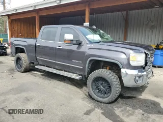 2015 GMC Sierra 2500HD SLT with VIN 1GT12ZE85FF589148, listed as a Copart auction lot 51329515 with 194,378 mi miles and Salvage title. Bid and sale history available at DreamBid. Image 4.