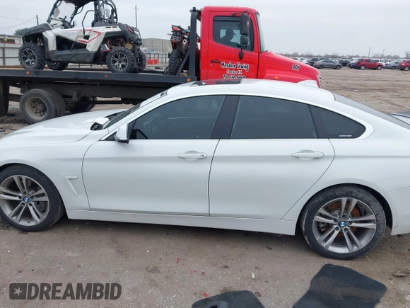 2018 BMW 4 Series 440i with VIN WBA4J5C56JBF07087, listed as a IAAI auction lot 41421921 with 61,601 mi miles and . Bid and sale history available at DreamBid. Image 14.