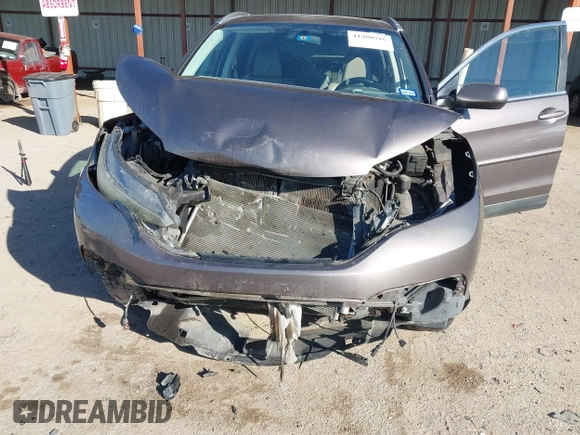 2014 Honda CR-V EX-L with VIN 5J6RM4H74EL017601, listed as a IAAI auction lot 41480716 with 187,685 mi miles. Bid and sale history available at carsss.com. Image 6.