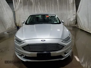 2017 Ford Fusion Hybrid Titanium with VIN 3FA6P0RU7HR383920, listed as a Copart auction lot 56320585 with 20,446 mi miles and Non repairable. Bid and sale history available at DreamBid. Image 5.