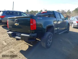 2015 Chevrolet Colorado 4WD Z71 with VIN 1GCGTCE31F1163947, listed as a IAAI auction lot 40997814 with 101,884 mi miles. Bid and sale history available at carsss.com. Image 4.