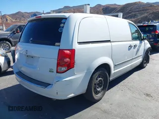 2014 Ram Cargo Van Tradesman with VIN 2C4JRGAG3ER379605, listed as a IAAI auction lot 40914636 with 156,793 mi miles. Bid and sale history available at carsss.com. Image 4.