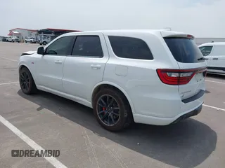 2018 Dodge Durango SRT with VIN 1C4SDJGJ2JC434843, listed as a IAAI auction lot 42434327 with 144,483 mi miles and . Bid and sale history available at DreamBid. Image 3.