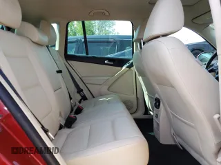 2012 Volkswagen Tiguan SE z VIN WVGAV7AXXCW005665, wystawiony jako Copart lot #58413145 z przebiegiem 197 505 mil mil oraz Tytuł czysty. Historia ofert i sprzedaży dostępna na DreamBid. Obrazek 11.