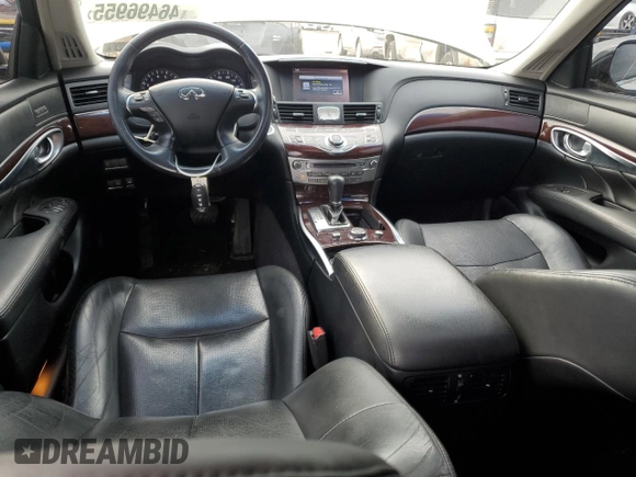 2015 Infiniti Q70 with VIN JN1BY1AR0FM561260, listed as a Copart auction lot 46496955 with 69,792 mi miles and Salvage title. Bid and sale history available at DreamBid. Image 8.