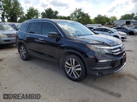 2017 Honda Pilot Touring with VIN 5FNYF6H99HB018503, listed as a Copart auction lot 63087025 with 369,312 mi miles and Clean title. Bid and sale history available at DreamBid. Image 4.