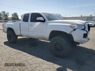 2021 Toyota Tacoma SR with VIN 3TYRX5GNXMT030793, listed as a Copart auction lot 58093425 with 122,039 mi miles and Salvage title. Bid and sale history available at DreamBid. Image 4.