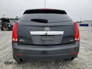 2015 Cadillac SRX Performance Collection with VIN 3GYFNCE38FS597717, listed as a Copart auction lot 57629615 with 102,689 mi miles and Salvage title. Bid and sale history available at DreamBid. Image 6.