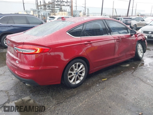 2019 Ford Fusion SE with VIN 3FA6P0HD0KR104302, listed as a IAAI auction lot 41550333 with 73,894 mi miles. Bid and sale history available at carsss.com. Image 4.