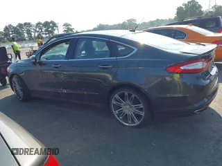 2016 Ford Fusion Titanium with VIN 3FA6P0K90GR188049, listed as a IAAI auction lot 42575477 with 239,414 mi miles and . Bid and sale history available at DreamBid. Image 14.