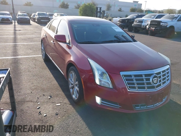 2013 Cadillac XTS Luxury with VIN 2G61P5S3XD9115546, listed as a IAAI auction lot 41980135 with 104,609 mi miles and . Bid and sale history available at DreamBid. Image 1.
