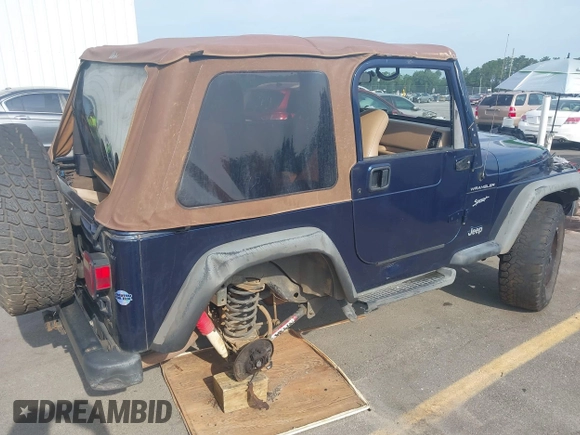 2002 Jeep Wrangler Sport with VIN 1J4FA49S72P729703, listed as a IAAI auction lot 42468446 with 164,342 mi miles and . Bid and sale history available at DreamBid. Image 6.