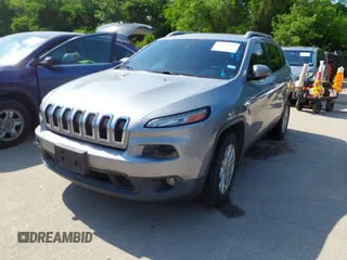 2014 Jeep Cherokee Latitude with VIN 1C4PJMCB4EW315520, listed as a IAAI auction lot 42034989 with 215,758 mi miles and . Bid and sale history available at DreamBid. Image 17.