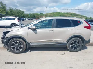 2017 Honda CR-V Touring with VIN 5J6RW2H91HL013526, listed as a IAAI auction lot 42181848 with 108,126 mi miles and . Bid and sale history available at carsss.com. Image 15.