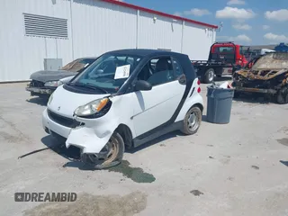 2009 Smart fortwo Pure with VIN WMEEJ31XX9K302737, listed as a IAAI auction lot 42124550 with 43,610 mi miles and . Bid and sale history available at DreamBid. Image 2.