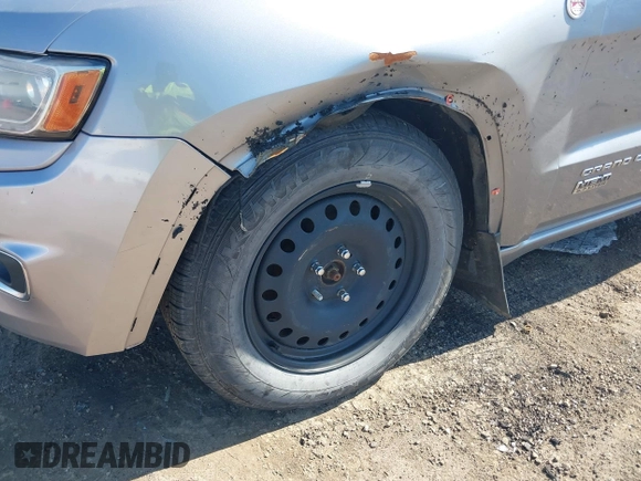 2014 Jeep Grand Cherokee Overland with VIN 1C4RJFCT9EC231840, listed as a IAAI auction lot 42114284 with 170,691 mi miles and . Bid and sale history available at DreamBid. Image 6.