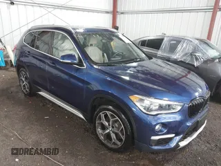 2019 BMW X1 xDrive28i z VIN WBXHT3C56K3H34720, wystawiony jako IAAI lot #42113497 z przebiegiem 64 906 mil mil oraz . Historia ofert i sprzedaży dostępna na DreamBid. Obrazek 1.