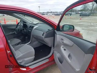 2009 Toyota Corolla with VIN JTDBL40E099028277, listed as a IAAI auction lot 42093963 with 151,846 mi miles. Bid and sale history available at carsss.com. Image 5.