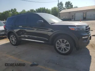 2023 Ford Explorer XLT with VIN 1FMSK8DH7PGB08372, listed as a Copart auction lot 62395205 with 63,257 mi miles and Salvage title. Bid and sale history available at DreamBid. Image 4.