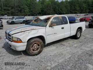 2000 Dodge Dakota z VIN 1B7GL22Z8YS588811, wystawiony jako Copart lot #57253645 z przebiegiem Nie podano mil oraz Szkoda całkowita • Salvage title. Historia ofert i sprzedaży dostępna na DreamBid. Obrazek 1.
