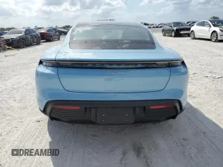 2024 Porsche Taycan z VIN WP0AA2Y17RSA10720, wystawiony jako Copart lot #50988475 z przebiegiem 2 836 mil mil oraz Szkoda całkowita • Salvage title. Historia ofert i sprzedaży dostępna na DreamBid. Obrazek 6.