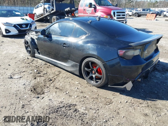 2014 Scion FR-S z VIN JF1ZNAA14E9708590, wystawiony jako IAAI lot #41278089 z przebiegiem 117 357 mil mil oraz . Historia ofert i sprzedaży dostępna na DreamBid. Obrazek 3.