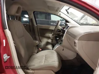 2008 Dodge Caliber SE with VIN 1B3HB28B48D634707, listed as a IAAI auction lot 41636023 with 149,652 mi miles and . Bid and sale history available at carsss.com. Image 5.