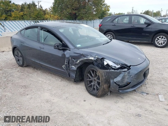 2023 Tesla Model 3 z VIN 5YJ3E1EA3PF699724, wystawiony jako IAAI lot #40654814 z przebiegiem Nie podano mil oraz . Historia ofert i sprzedaży dostępna na DreamBid. Obrazek 1.
