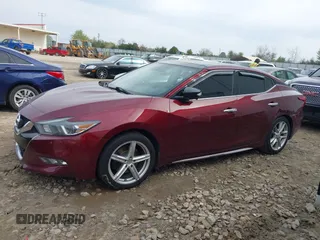 2016 Nissan Maxima SL with VIN 1N4AA6AP0GC396719, listed as a IAAI auction lot 41783950 with 210,850 mi miles and . Bid and sale history available at DreamBid. Image 14.