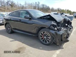 2025 BMW X6 xDrive40i z VIN 5UX33EX05S9Z28763, wystawiony jako Copart lot #54533525 z przebiegiem 1329 mil mil oraz Szkody całkowita. Historia ofert i sprzedaży dostępna na DreamBid. Obrazek 4.
