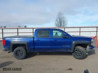 2014 Chevrolet Silverado 1500 LT with VIN 3GCUKREC1EG328016, listed as a IAAI auction lot 41880166 with 164,486 mi miles. Bid and sale history available at carsss.com. Image 13.