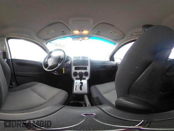 2009 Dodge Caliber SXT z VIN 1B3HB48A79D171465, wystawiony jako IAAI lot #42137493 z przebiegiem 161 046 mil mil oraz . Historia ofert i sprzedaży dostępna na DreamBid. Obrazek 19.