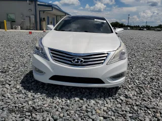 2013 Hyundai Azera z VIN KMHFH4JG4DA310590, wystawiony jako Copart lot #62472335 z przebiegiem 75 311 mil mil oraz Nie do naprawy • Non repairable. Historia ofert i sprzedaży dostępna na DreamBid. Obrazek 5.