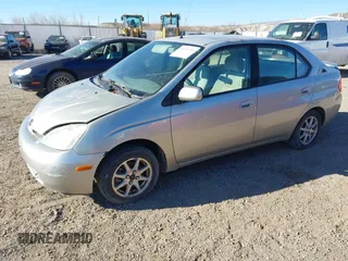 2003 Toyota Prius with VIN JT2BK18U330071125, listed as a IAAI auction lot 41345793 with 230,618 mi miles. Bid and sale history available at carsss.com. Image 2.
