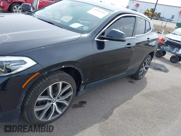 2020 BMW X2 xDrive28i with VIN WBXYJ1C02L5R71755, listed as a IAAI auction lot 41957012 with 69,997 mi miles. Bid and sale history available at carsss.com. Image 6.