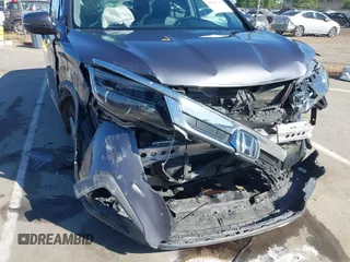 2020 Honda Pilot EX-L with VIN 5FNYF5H51LB020830, listed as a IAAI auction lot 42255746 with 60,503 mi miles and . Bid and sale history available at DreamBid. Image 19.