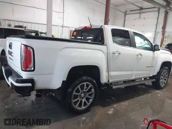 2021 GMC Canyon 4WD Denali with VIN 1GTG6EEN0M1229180, listed as a IAAI auction lot 41298304 with 55,865 mi miles. Bid and sale history available at carsss.com. Image 14.
