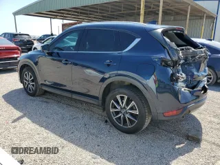 2018 Mazda CX-5 Grand Touring с VIN JM3KFBDM8J0344328, выставлен на аукционе Copart как лот 57665175 с пробегом 131 175 миль миль и Списание • Salvage title. История ставок и продаж доступна на DreamBid. Изображение 2.