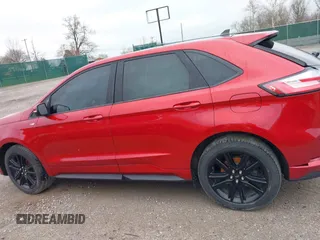 2020 Ford Edge SEL z VIN 2FMPK3J94LBB54068, wystawiony jako IAAI lot #41912225 z przebiegiem 83 528 mil mil oraz . Historia ofert i sprzedaży dostępna na DreamBid. Obrazek 14.