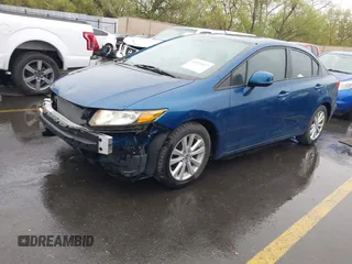 2012 Honda Civic EX with VIN 2HGFB2F89CH537142, listed as a IAAI auction lot 42024927 with 123,063 mi miles and . Bid and sale history available at DreamBid. Image 2.