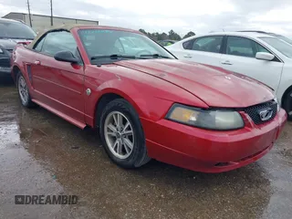 2004 Ford Mustang Deluxe with VIN 1FAFP44624F197158, listed as a IAAI auction lot 41712280 with 136,762 mi miles. Bid and sale history available at carsss.com. Image 1.