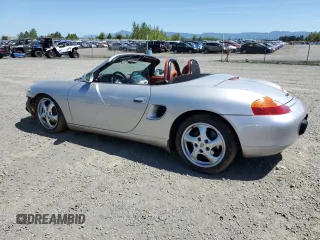 1998 Porsche Boxster z VIN WP0CA2986WU620657, wystawiony jako Copart lot #55595275 z przebiegiem 78 711 mil mil oraz Szkoda całkowita • Salvage title. Historia ofert i sprzedaży dostępna na DreamBid. Obrazek 2.
