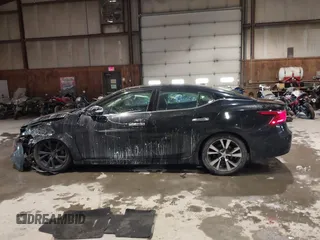 2017 Nissan Maxima SV with VIN 1N4AA6AP6HC451921, listed as a IAAI auction lot 41384995 with 74,160 mi miles and . Bid and sale history available at DreamBid. Image 15.